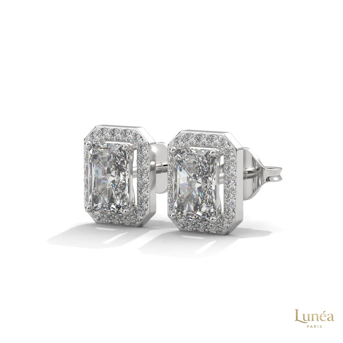 Emerald-cut lab-grown diamond halo stud earrings set in polished 14K gold.