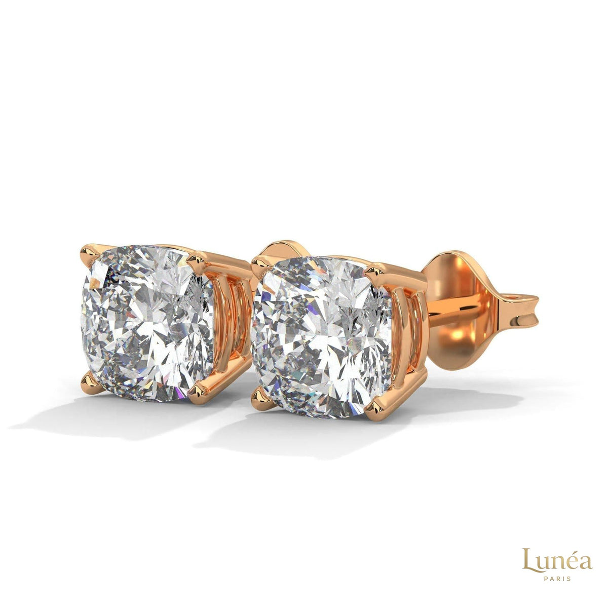 1.25 CT cushion-cut lab-grown diamond stud earrings set in polished 14K white gold for a brilliant, timeless look.