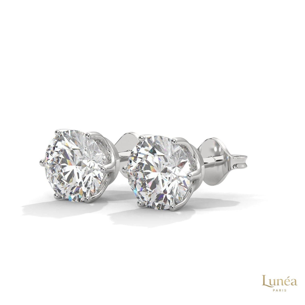 1.30 CT round lab-grown diamond stud earrings in a classic 14K gold six-prong setting.