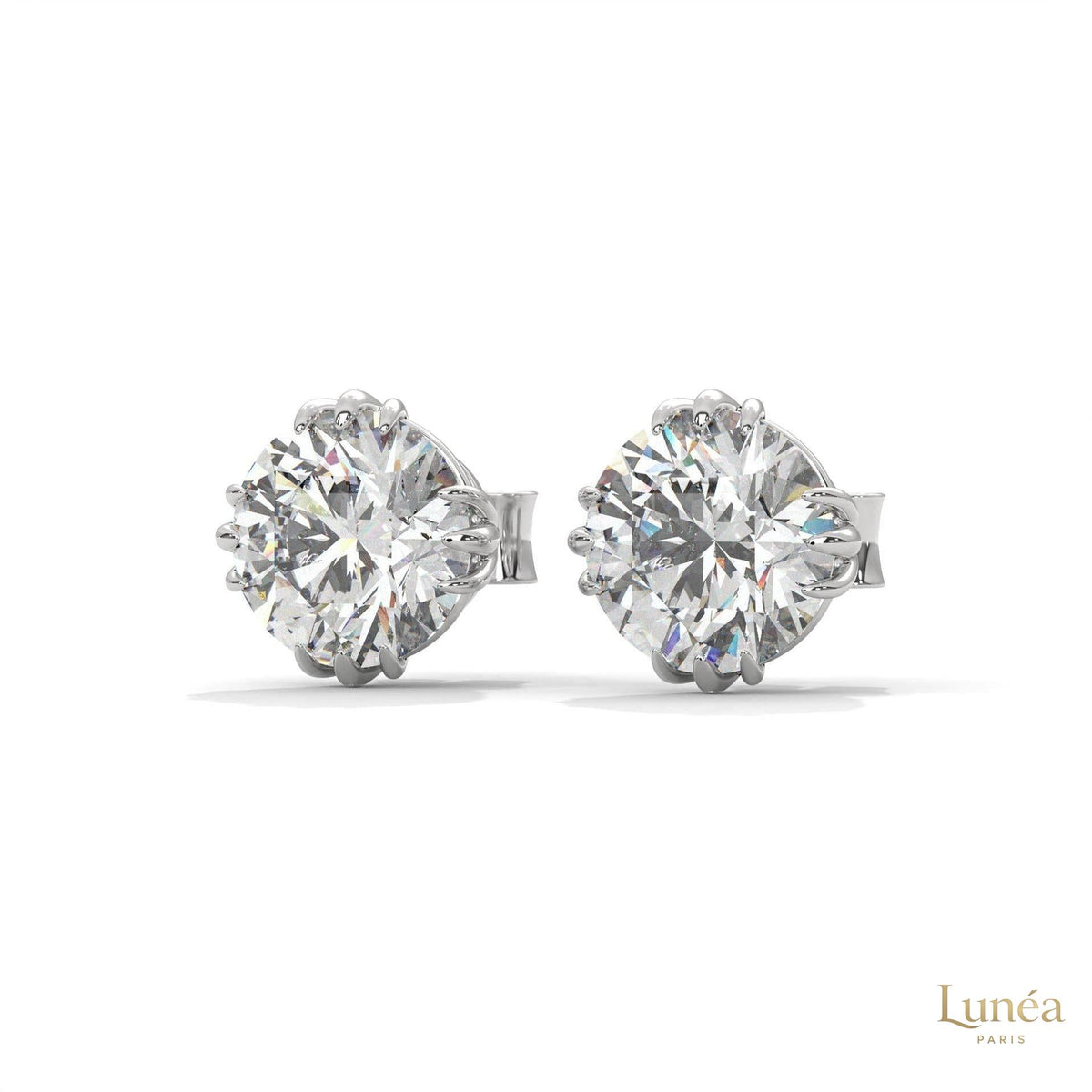 1.30 CT round lab-grown diamond stud earrings in a floral crown setting, crafted in polished 14K white gold.