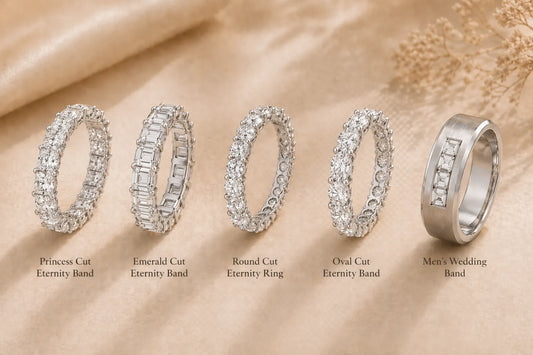 Assortment of diamond eternity bands and a brushed silver men's wedding ring on beige fabric.