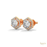 0.22ct hexagon halo stud earrings featuring a round lab-grown diamond in 14K gold with a geometric pavé setting.