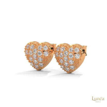 0.30ct heart-shaped stud earrings featuring pavé-set round lab-grown diamonds in polished 14K gold.