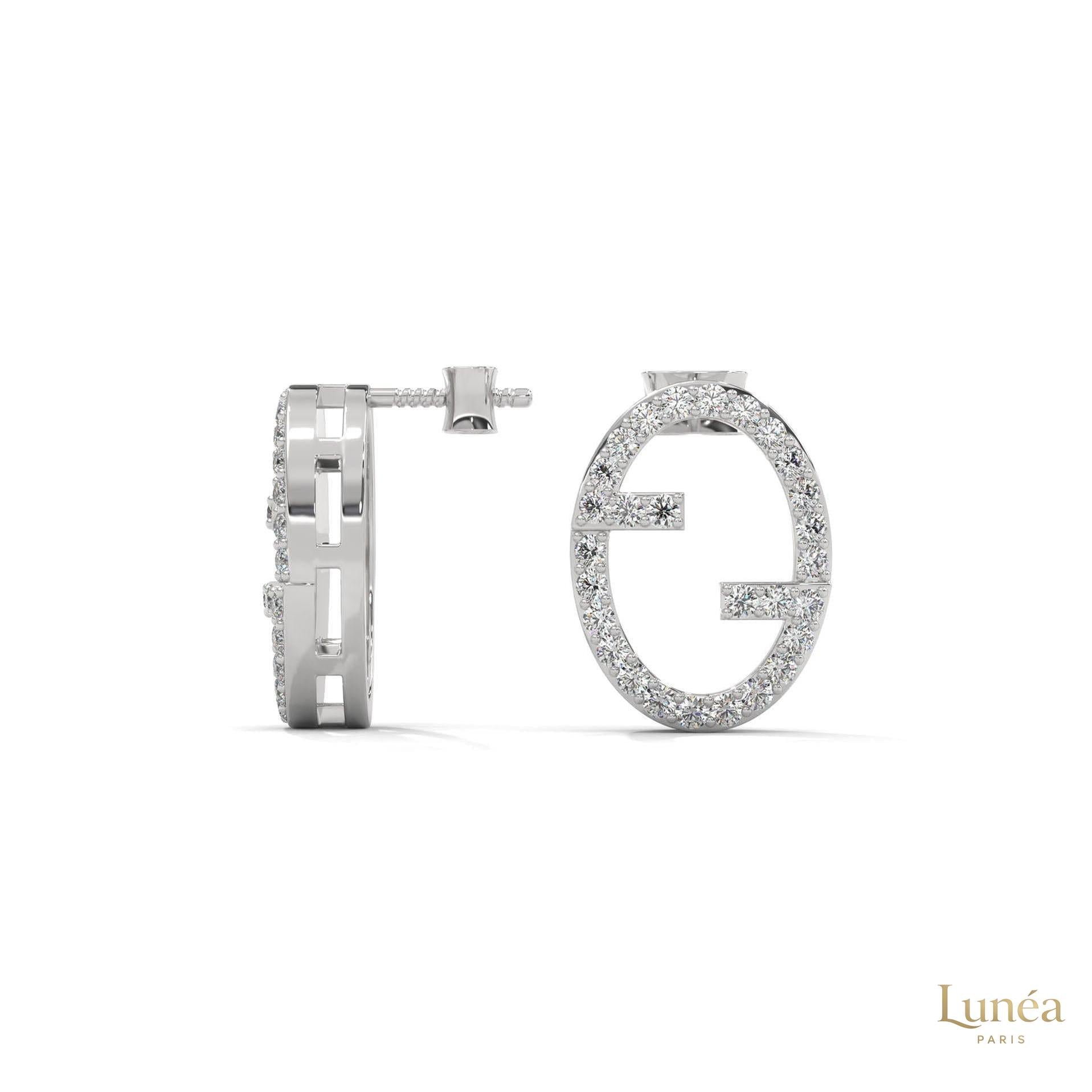 0.30 CT. Diamond Oval Logo Stud Earrings