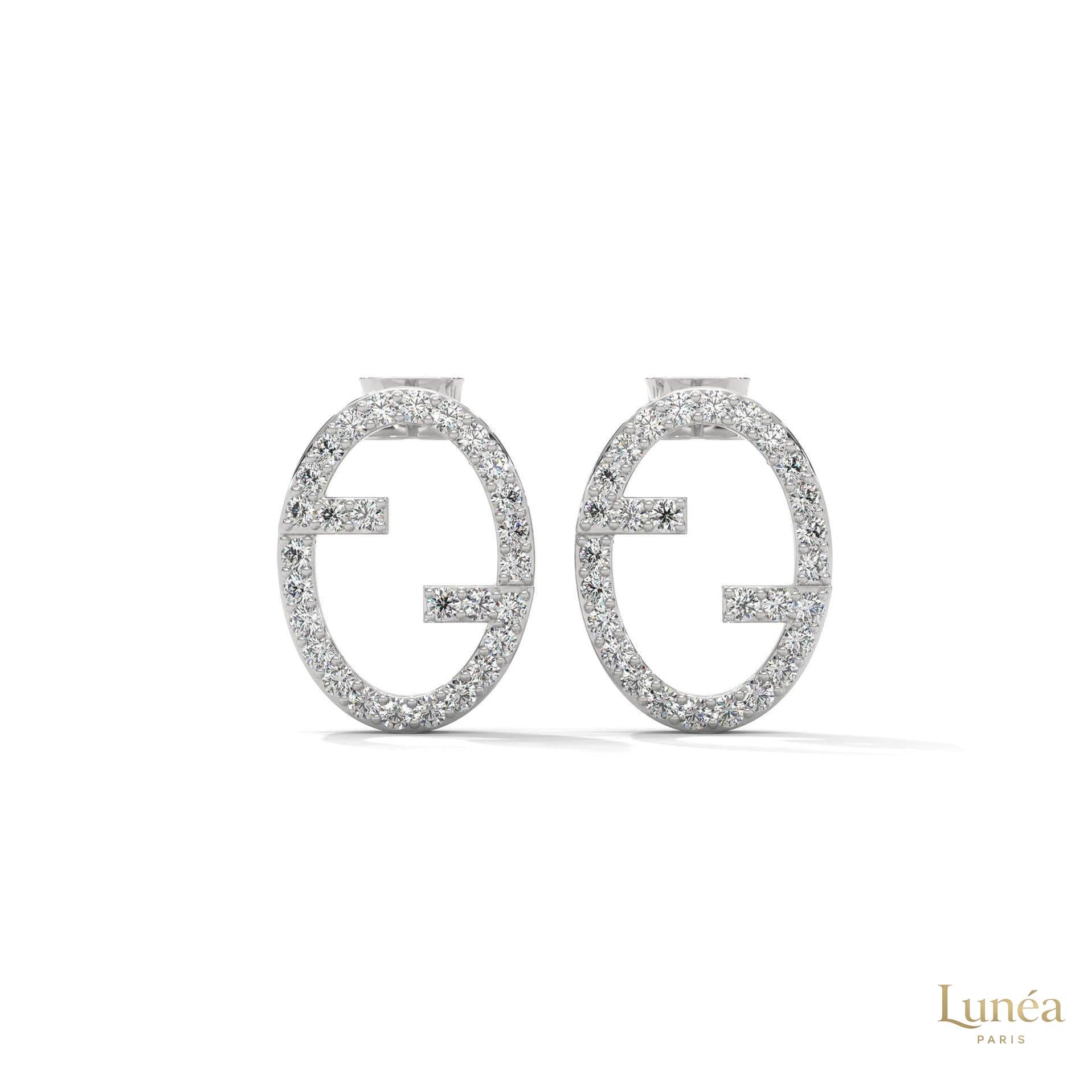 0.30 CT. Diamond Oval Logo Stud Earrings