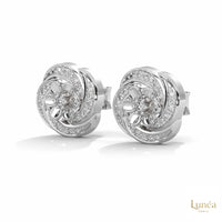 0.40 CT floral cluster diamond stud earrings in polished platinum with round brilliant lab-grown diamonds.