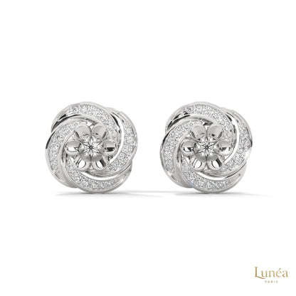 0.40 CT floral cluster diamond stud earrings in 14K gold with round brilliant lab-grown diamonds in a delicate petal design.