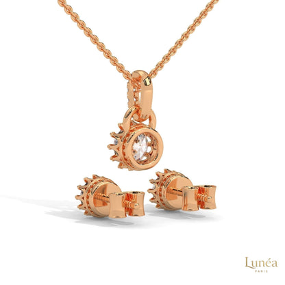 Rose gold crown pendant and stud earring set featuring round lab-grown diamonds with regal detailing.