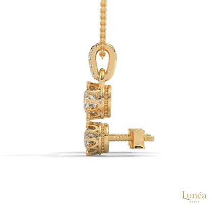 14K yellow gold crown diamond pendant and stud earring set with round lab-grown diamonds in a regal setting.