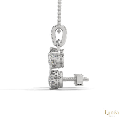 Side view of a 14K white gold crown diamond pendant and stud earring set with round brilliant lab-grown diamonds.