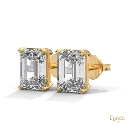 1 carat emerald-cut lab-grown diamond stud earrings set in polished 14K white gold.