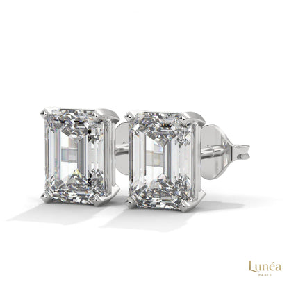 Emerald-cut lab-grown diamond stud earrings set in polished 14K white gold.