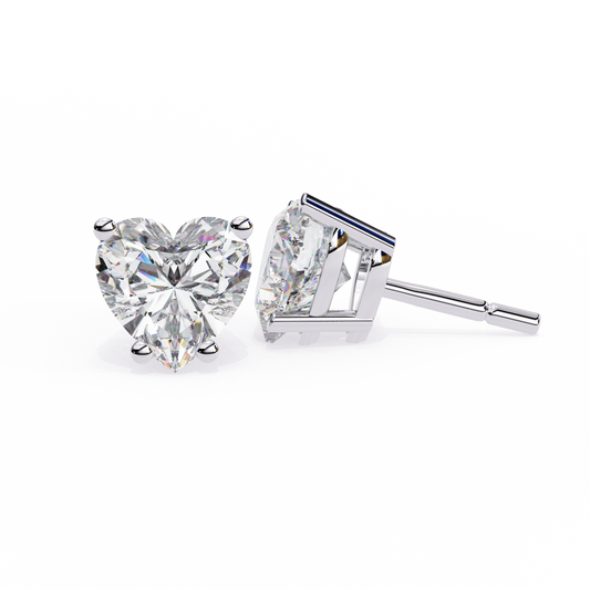 2.43 CTW heart-cut lab-grown diamond stud earrings set in polished platinum.