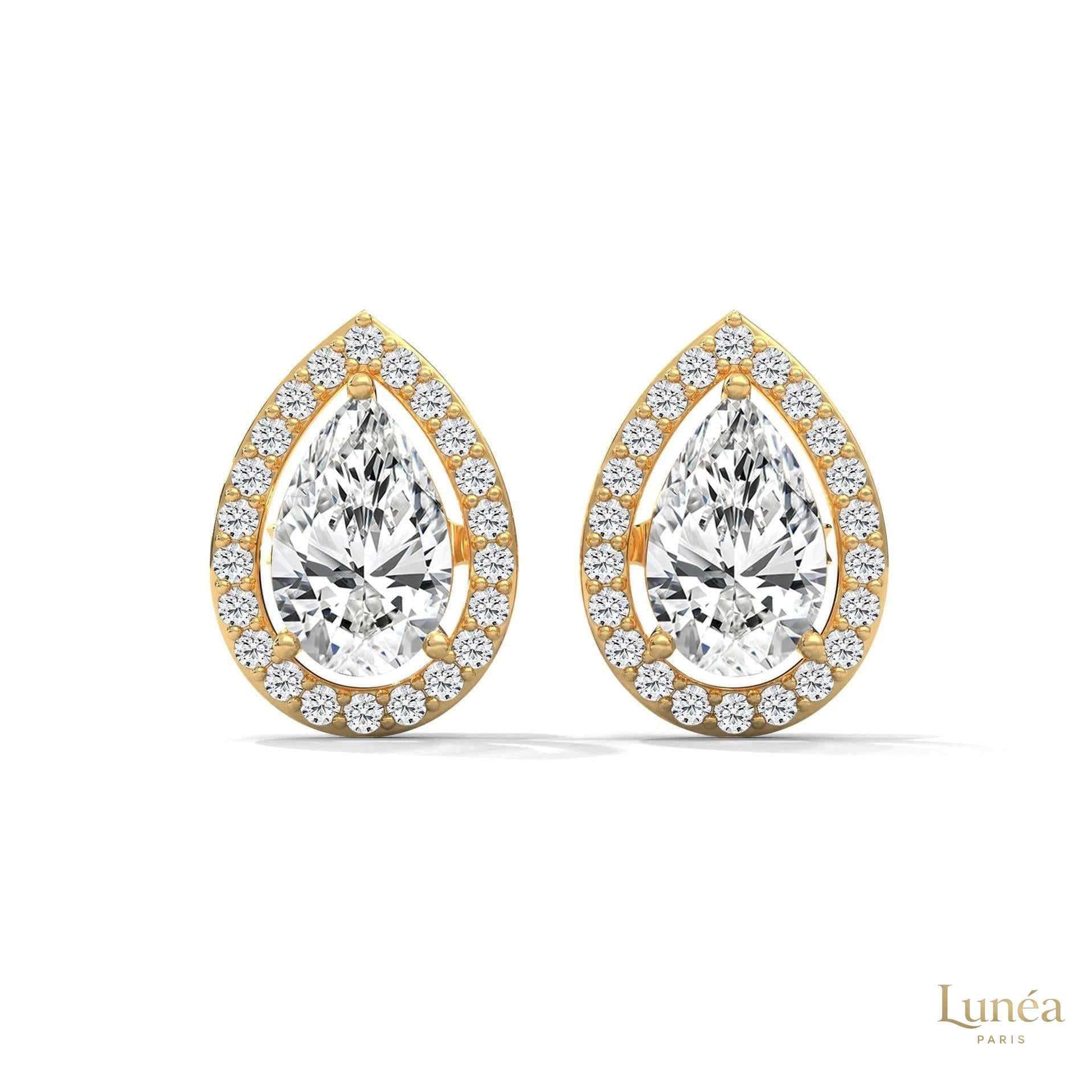 1.09 CT. Pear Diamond Halo Stud Earrings