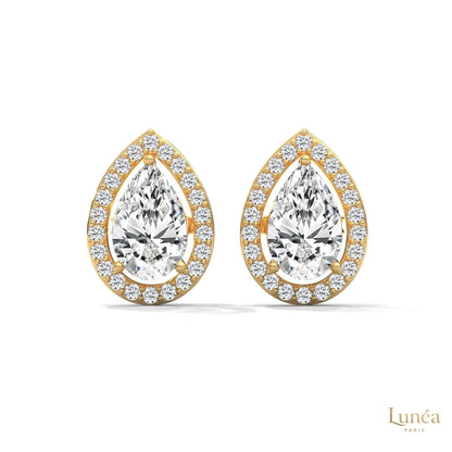 Pear-shaped lab-grown diamond halo stud earrings set in polished 14K gold with sparkling pavé accents.