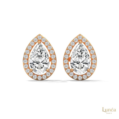 1.09 CT pear-shaped lab-grown diamond halo stud earrings in 14K gold with pavé setting.