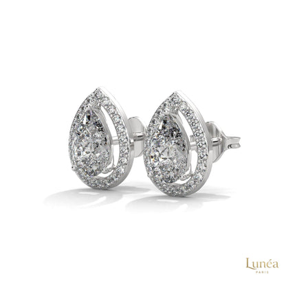 1.09 CT pear-shaped lab-grown diamond halo stud earrings set in polished 14K gold with sparkling pavé accents.
