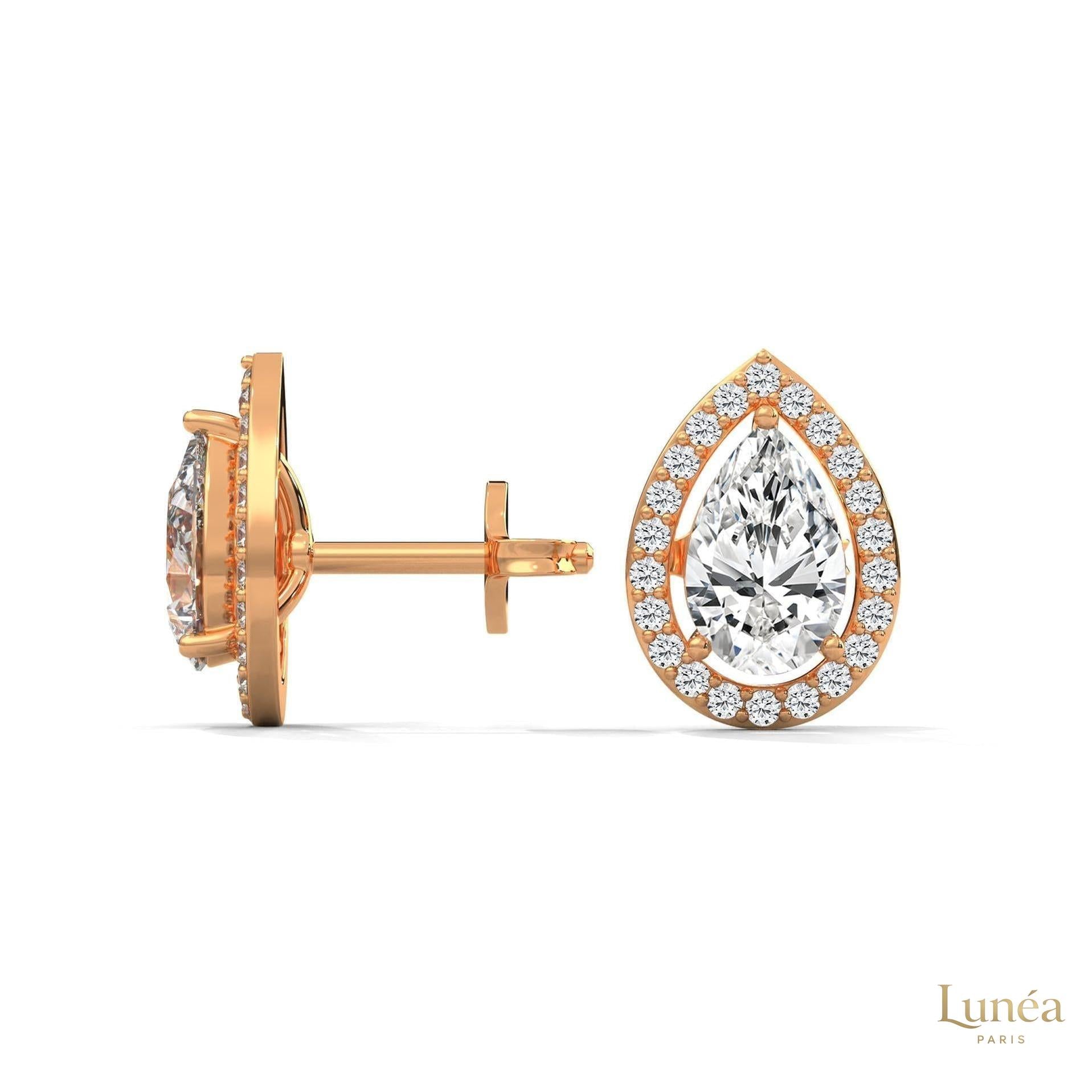 1.09 CT. Pear Diamond Halo Stud Earrings