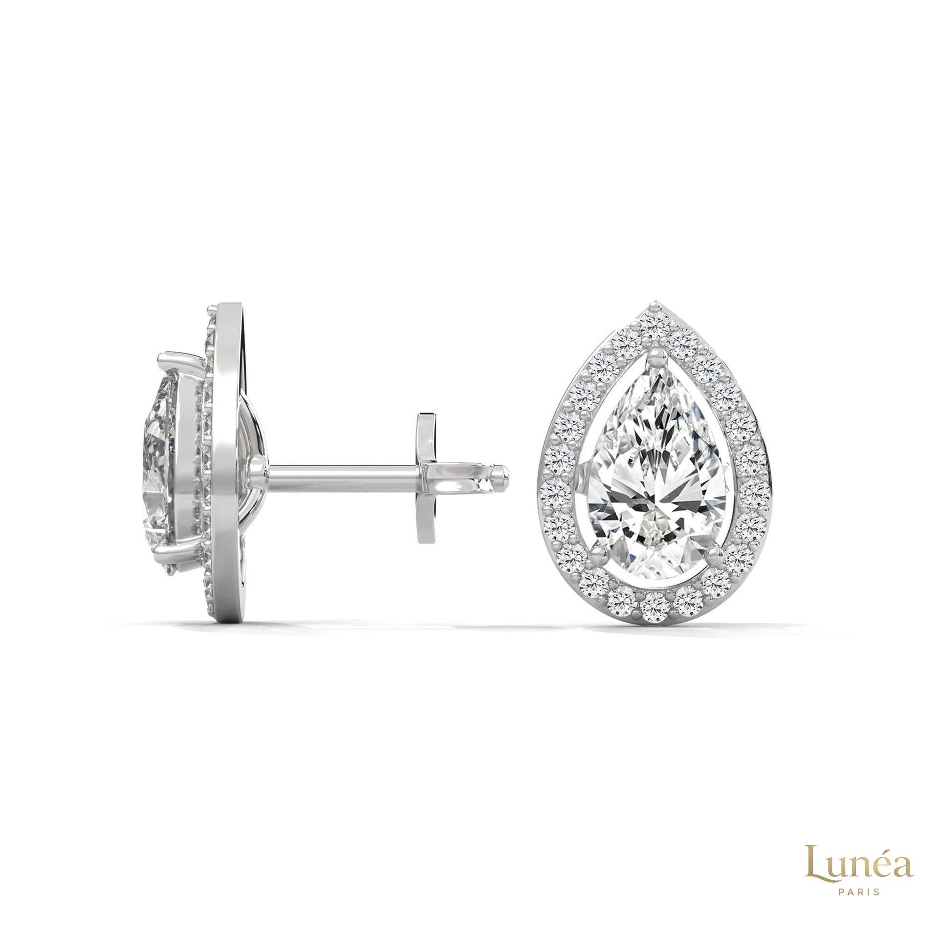 1.09 CT. Pear Diamond Halo Stud Earrings