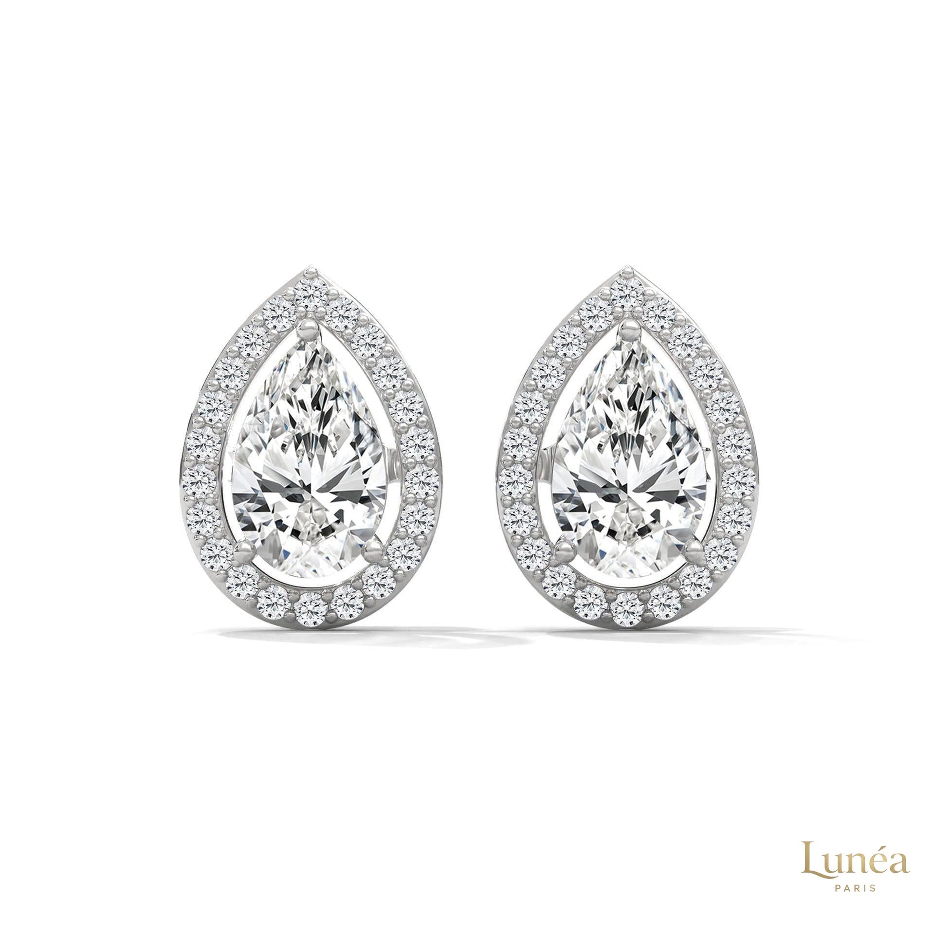 1.09 CT. Pear Diamond Halo Stud Earrings