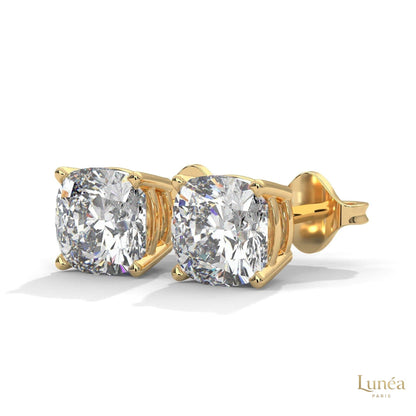 1.25 CT cushion-cut lab-grown diamond stud earrings set in polished 14K white gold for a brilliant, timeless look.