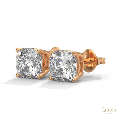 1.25 CT cushion-cut lab-grown diamond stud earrings set in polished 14K white gold for a brilliant, timeless look.