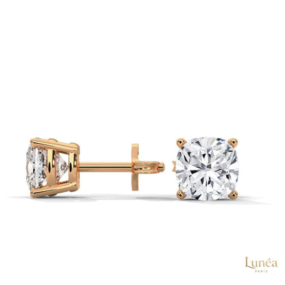 1.25 carat cushion-cut lab diamond stud earrings set in polished 14K rose gold.