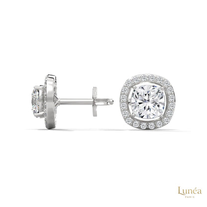 1.25 CT cushion halo diamond stud earrings in 14K white gold with pavé-set lab-grown diamonds.