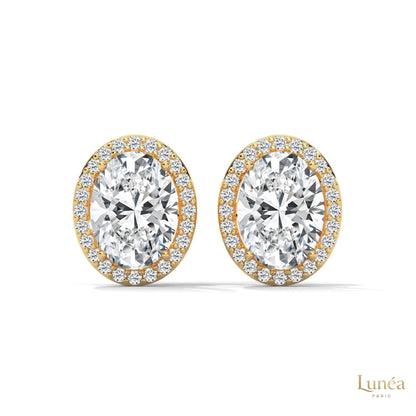 1.25 CT oval lab-grown diamond stud earrings in a pavé halo setting, available in 14K gold or platinum.