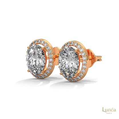 1.25 CT oval halo lab-grown diamond stud earrings set in polished 14K gold with a delicate pavé diamond border.