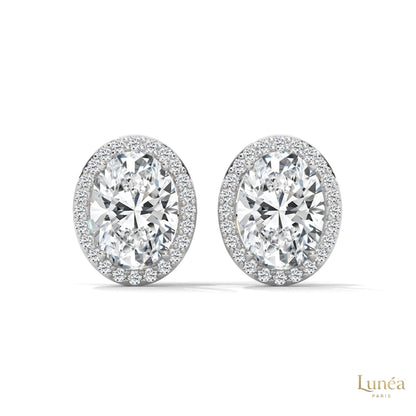 1.25 CT oval halo lab-grown diamond stud earrings set in polished 14K gold with a delicate pavé diamond border.