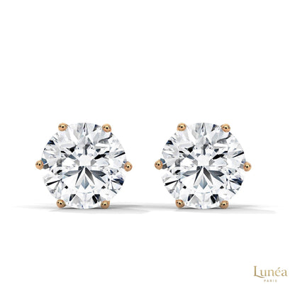 1.30 CT round lab-grown diamond stud earrings in a classic 6-prong setting, crafted in polished 14K white gold.