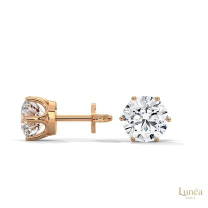 1.30 CT round lab-grown diamond stud earrings set in polished 14K rose gold with a classic secure 6-prong setting.