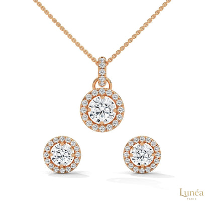 Rose gold halo diamond pendant and matching stud earring set with round lab-grown diamonds.