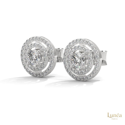 1.5 CT double halo lab-grown diamond stud earrings in 14K gold with a brilliant round center and pavé setting.