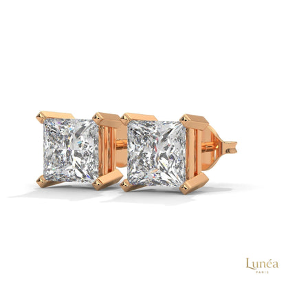 1.5 carat princess-cut lab-grown diamond stud earrings set in polished 14K white gold with a secure basket setting.