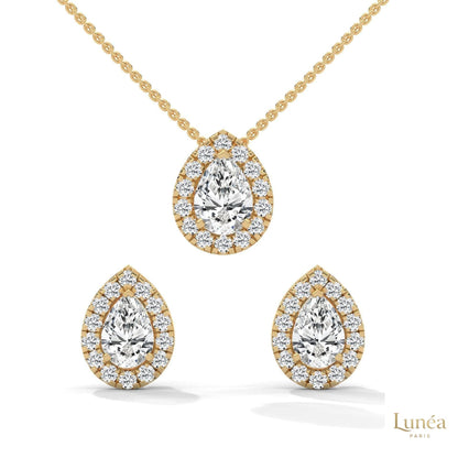Pear-cut lab-grown diamond pendant and stud earring set in 14K yellow gold with a sparkling diamond halo.