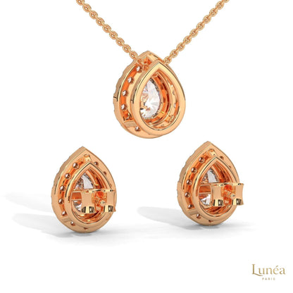 Rose gold pear-cut lab-grown diamond pendant necklace and matching halo stud earrings set.