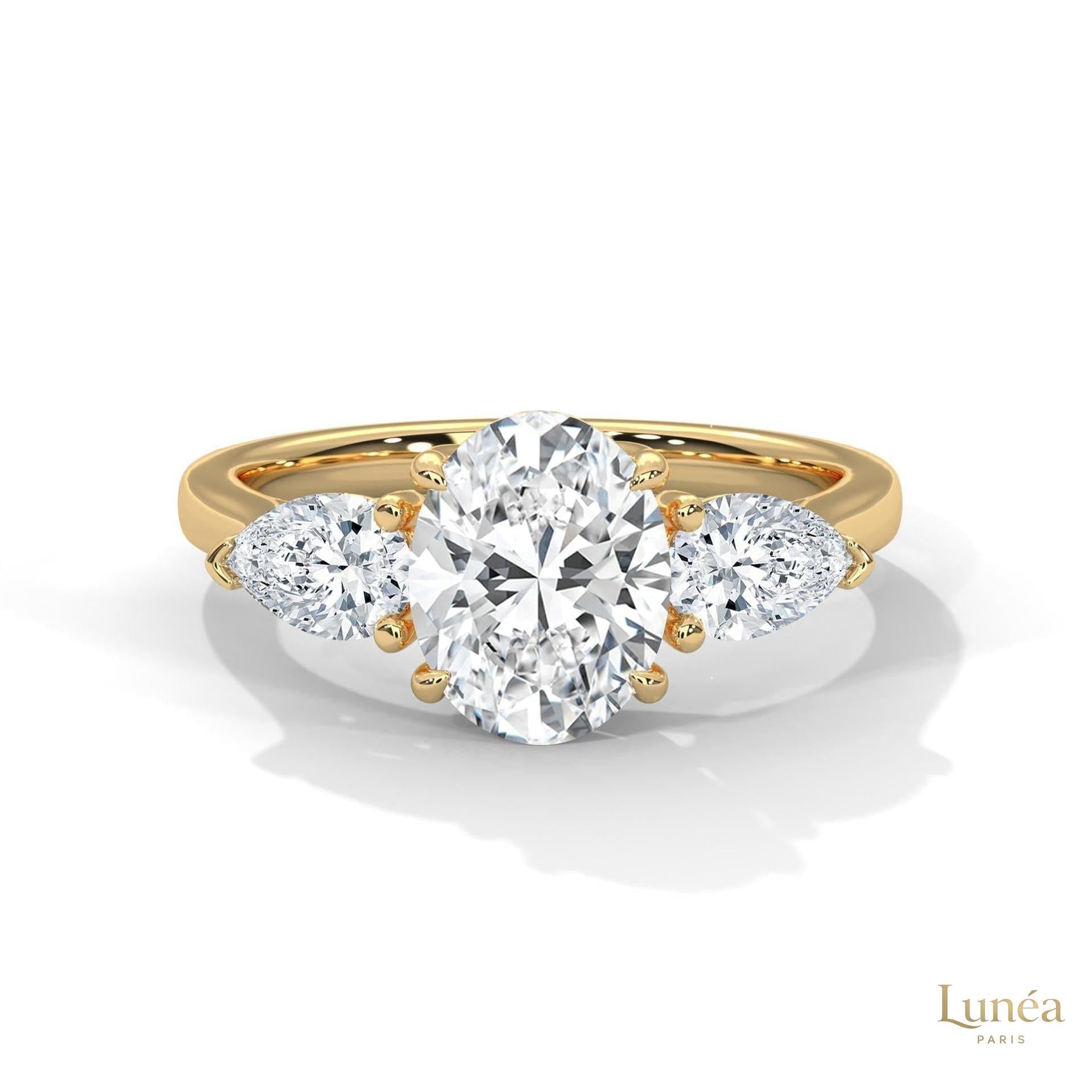 3 Ct. Oval Lab Diamond Ring – Three-Stone Pear Accents