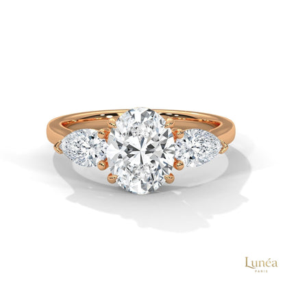 3 Ct. Oval Lab Diamond Ring – Three-Stone Pear Accents