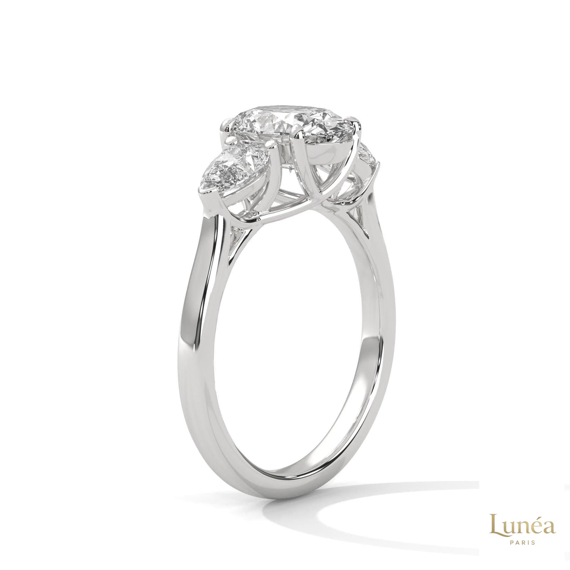 3 Ct. Oval Lab Diamond Ring – Three-Stone Pear Accents