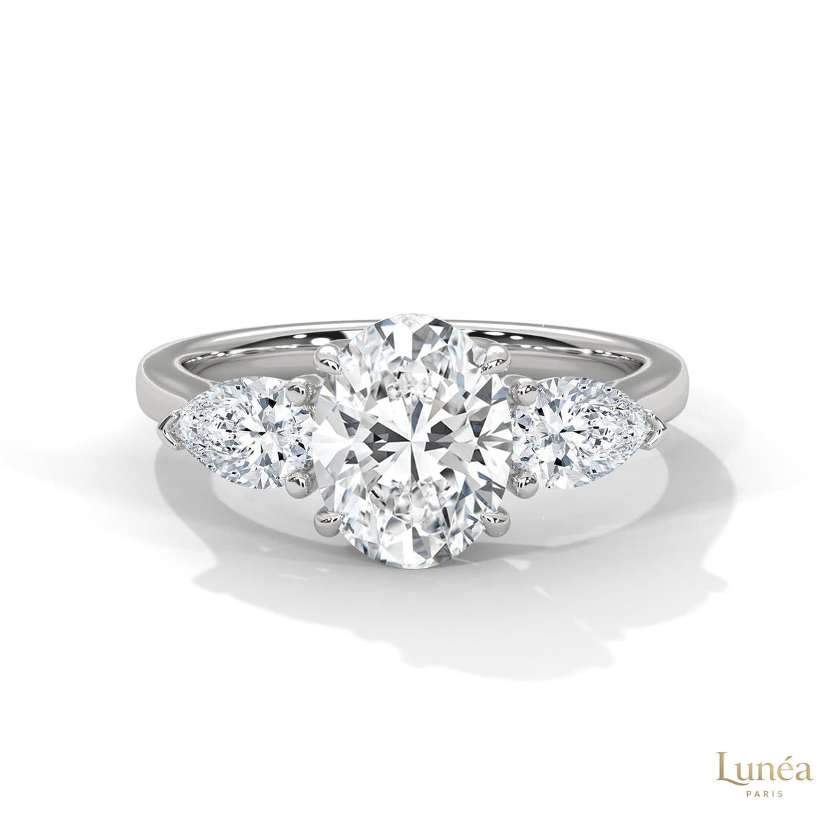 3 Ct. Oval Lab Diamond Ring – Three-Stone Pear Accents