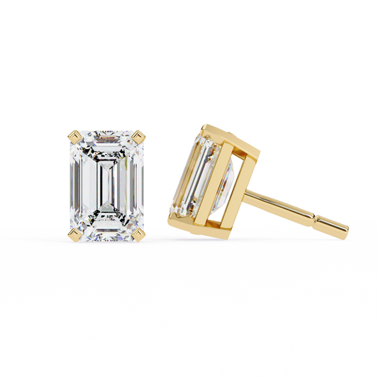 2.39 CTW emerald-cut lab-grown diamond stud earrings set in polished 14K yellow gold.