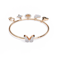 5.7 CTW Diamond Multi-Charm Bangle in Rose Gold front and detail view 3 – Lunéa Paris