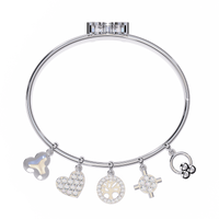 5.7 CTW Diamond Multi-Charm Bangle in White Gold front and detail view 8 – Lunéa Paris