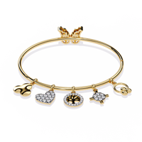 5.7 CTW Diamond Multi-Charm Bangle in Yellow Gold front and detail view 6 – Lunéa Paris