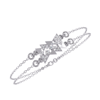 0.3 CTW geometric triangle pavé round diamond double-chain bracelet in White Gold, angled view – Lunéa Paris