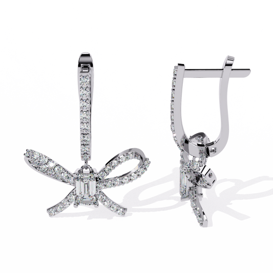1.2 CTW emerald and round diamond bow hoop drop earrings in White Gold, angled view – Lunéa Paris