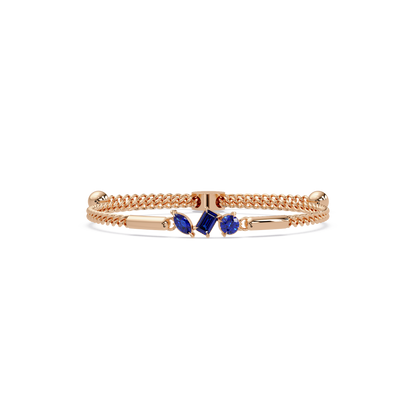 Three-stone mixed-cut colorstone hinged bangle in rose gold with sapphire stones
