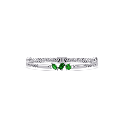 Three-stone mixed-cut colorstone hinged bangle in white gold with green stones